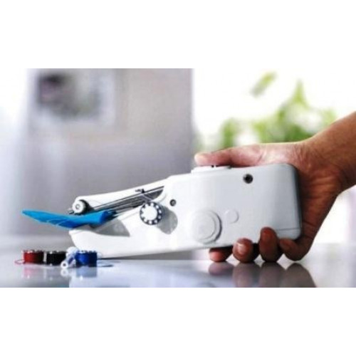 Портативная швейная машинка "The Handheld Sewing Machine" Портативная швейная машинка "The Handheld Sewing Machine"